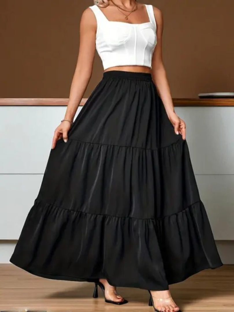 A Most Trending Ankle Length Skirt For Women's And Girl's Has Soft Rayon Fabric For Easy To Wear Every Day Has Solid Black Colour Elasticated Belt Tiered And Flared Skirt Type Which Gives You Western Look